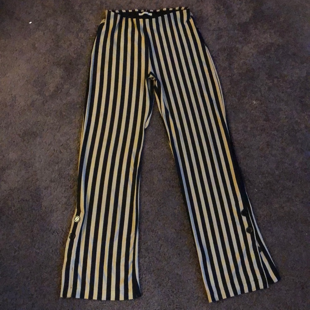 Black and Tan Zara pants with buttons on the flare
